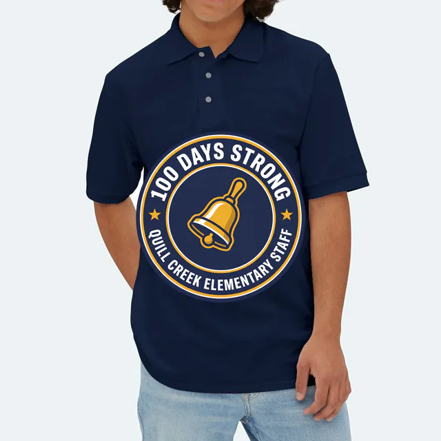 A school bell emblem for the Quill Creek staff, 100 DAYS STRONG, on a navy adult polo