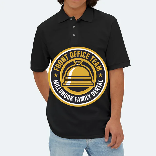 A service bell emblem for the Millbrook Family Dental front office, on a black adult polo