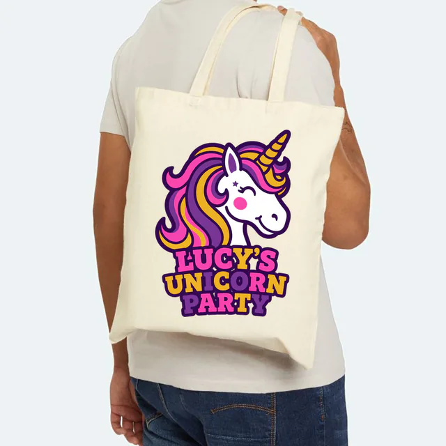 A unicorn with a rainbow mane, LUCY'S UNICORN PARTY, on a natural canvas tote
