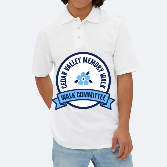 A forget-me-not emblem for the Cedar Valley walk committee, on a white adult polo