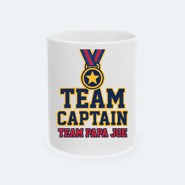 A star medal on a ribbon, TEAM CAPTAIN, on a white ceramic mug