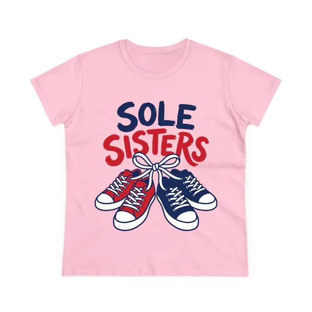 Two pairs of sneakers tied together, SOLE SISTERS, on a light pink women's t-shirt