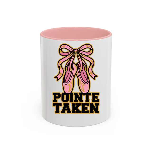 Pointe shoes tied in a bow, POINTE TAKEN, on a pink accent mug