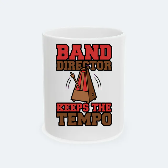 A swinging metronome, BAND DIRECTOR KEEPS THE TEMPO, on a white ceramic mug