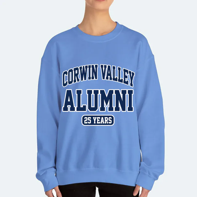 CORWIN VALLEY arched over ALUMNI and 25 YEARS, on a carolina blue adult crewneck