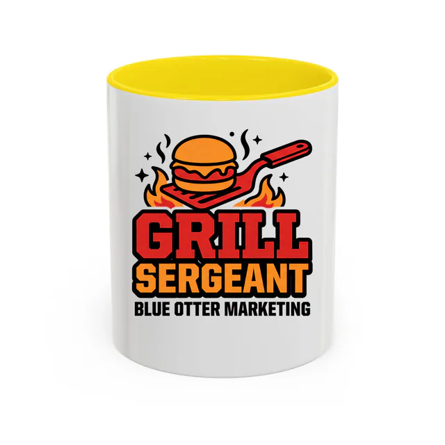 A burger on a spatula over the flames, GRILL SERGEANT, on a yellow accent mug