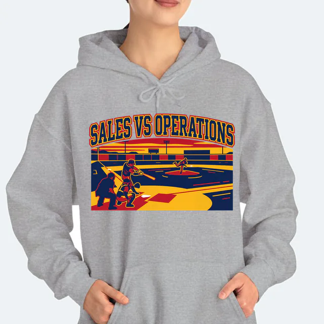 A batter mid-swing at dusk, SALES VS OPERATIONS, on a sport gray adult hoodie