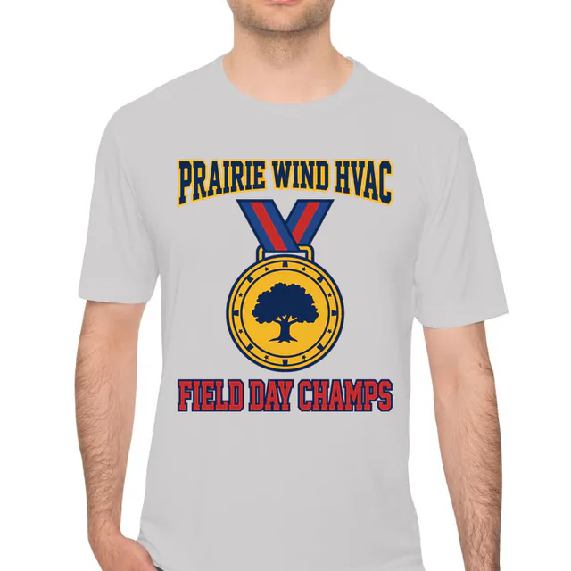 A gold medal for the Prairie Wind HVAC field day champs, on a silver performance tee