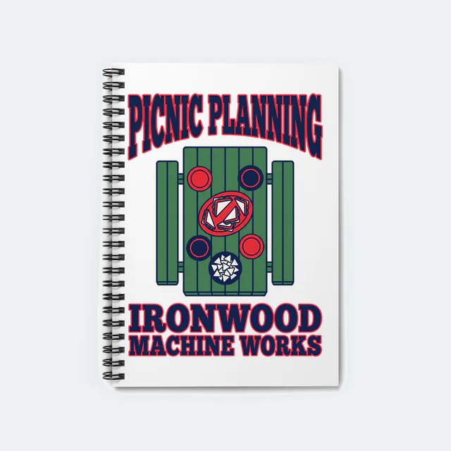A picnic table from above, PICNIC PLANNING, on a white spiral notebook