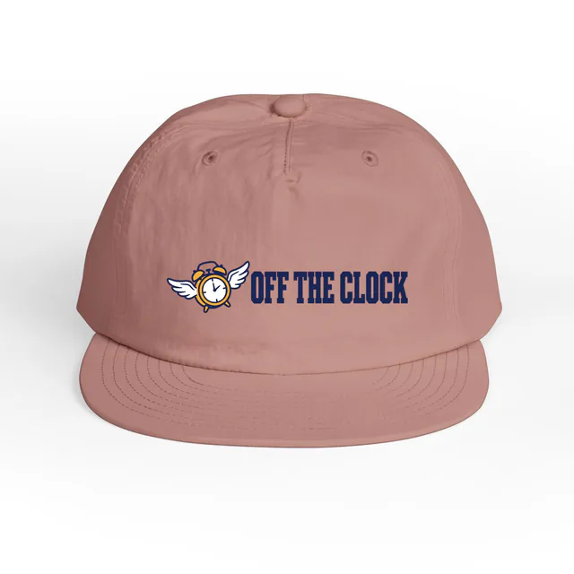 A winged alarm clock beside OFF THE CLOCK, on a hazy pink surf cap