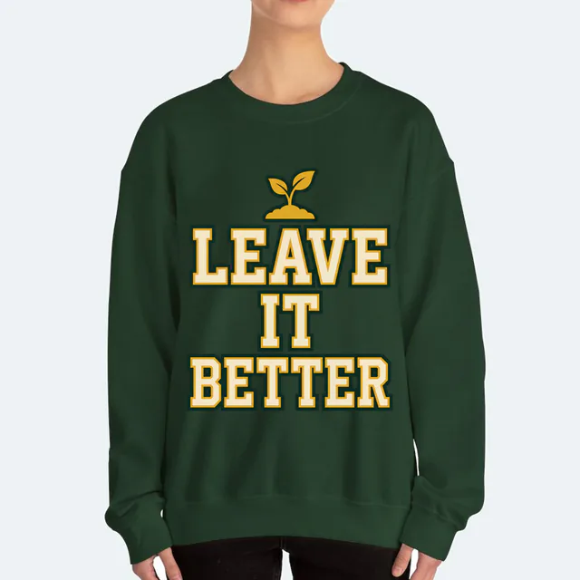 LEAVE IT BETTER in retro letters with a sprouting seedling, on a forest green adult crewneck