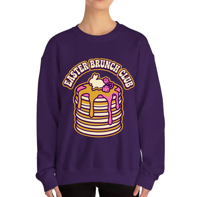 A pancake stack with a bunny pat of butter, EASTER BRUNCH CLUB, on a purple adult crewneck