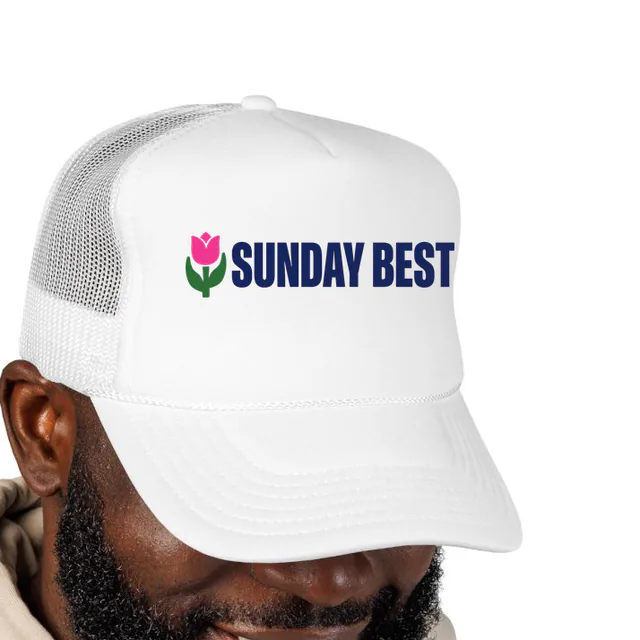 A pink tulip beside SUNDAY BEST, on a white foam trucker hat