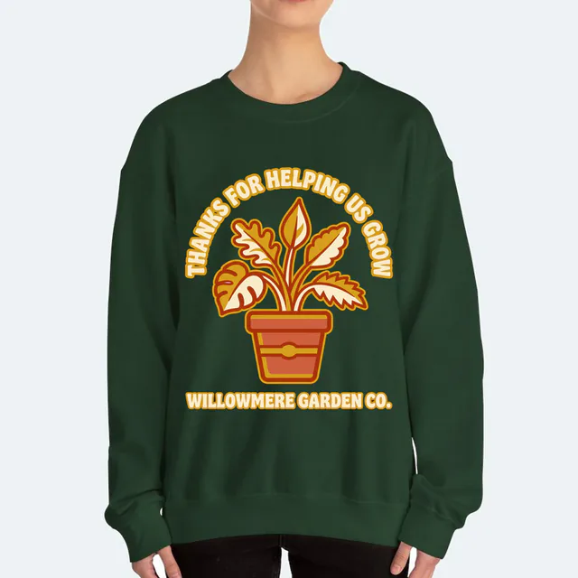 A sprouting potted plant, THANKS FOR HELPING US GROW, on a forest green adult crewneck