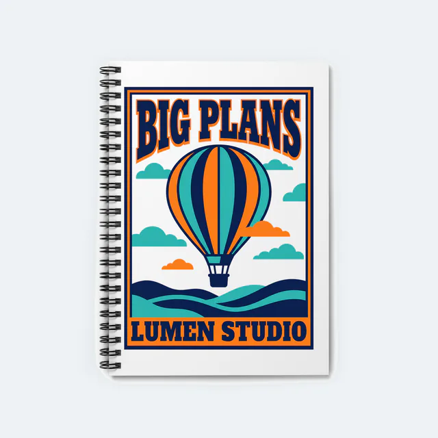 A hot air balloon over rolling hills, BIG PLANS, on a white spiral notebook