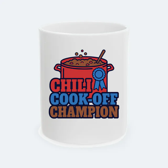 A bubbling pot of chili with a ribbon, CHILI COOK-OFF CHAMPION, on a white ceramic mug