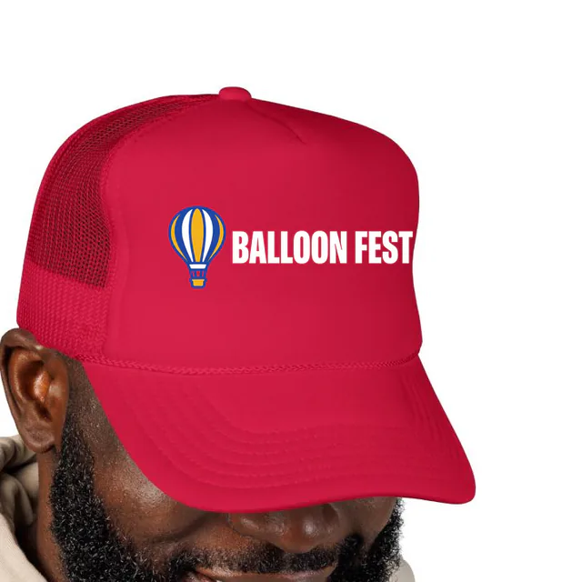 A hot air balloon beside BALLOON FEST, on a red foam trucker hat