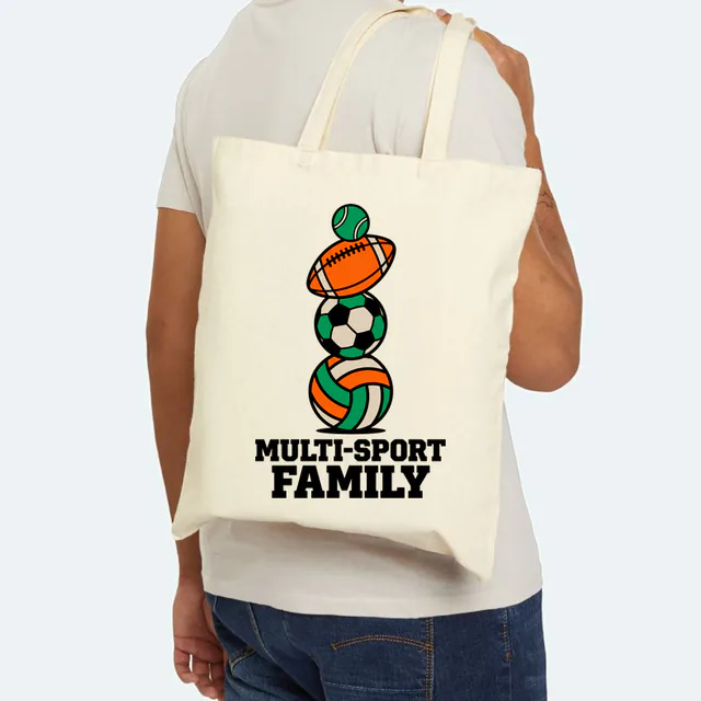 A balanced tower of balls for the MULTI-SPORT FAMILY, on a natural canvas tote