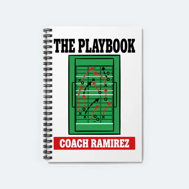 Dashed play arrows across a field, THE PLAYBOOK, on a white spiral notebook