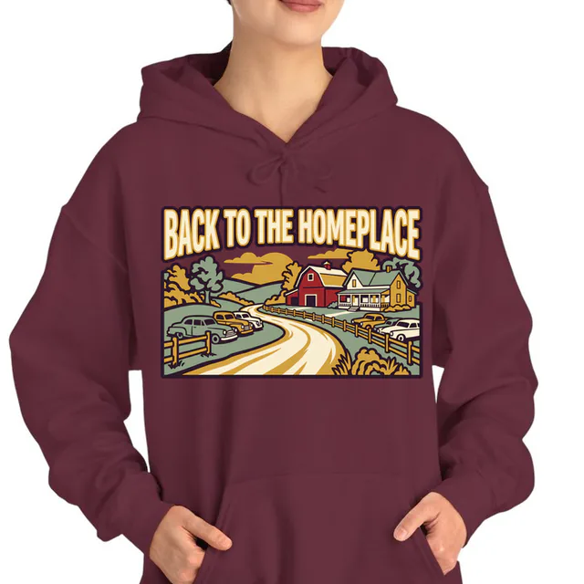 A barn and farmhouse down a country road, BACK TO THE HOMEPLACE, on a maroon adult hoodie
