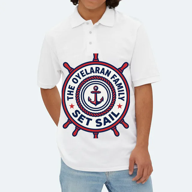 A ship wheel emblem for the Oyelaran family, SET SAIL, on a white adult polo