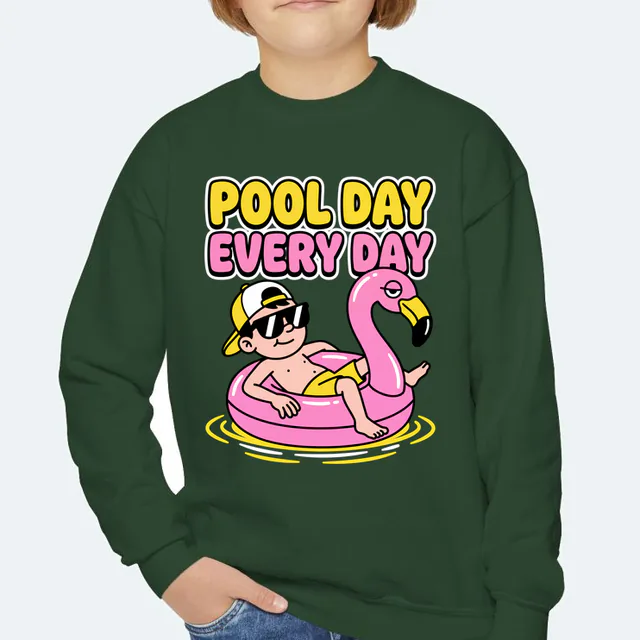 A kid lounging on a flamingo float, POOL DAY EVERY DAY, on a forest green youth crewneck