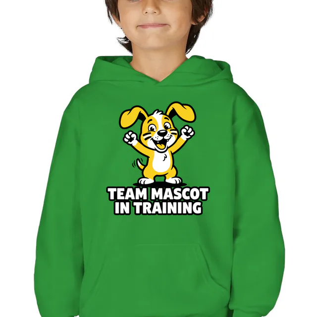 A puppy in face paint cheering, TEAM MASCOT IN TRAINING, on a kelly green youth hoodie