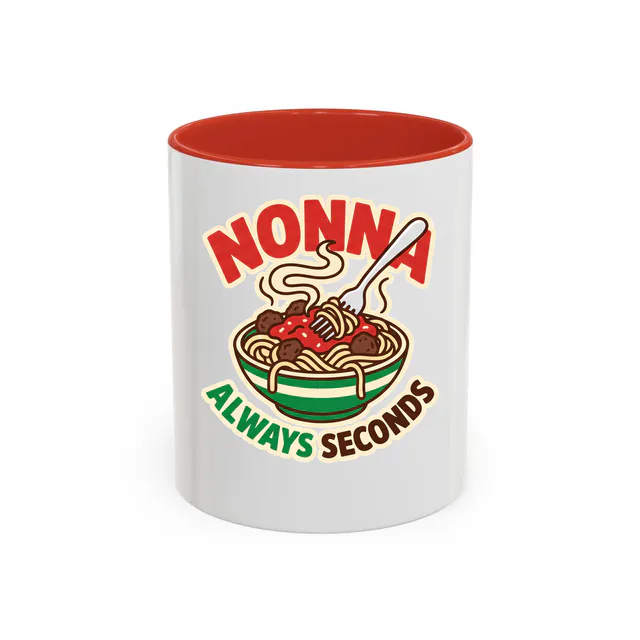 A bowl of spaghetti and meatballs, NONNA ALWAYS SECONDS, on a red accent mug
