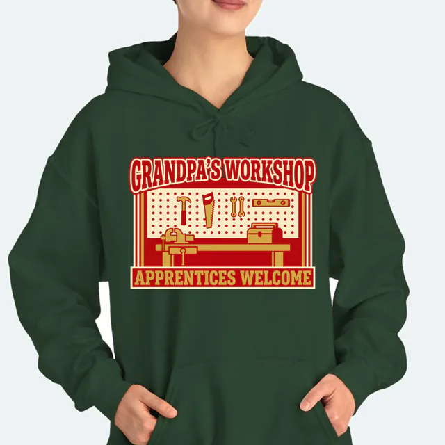 A pegboard of tools over the bench, GRANDPA'S WORKSHOP, on a forest green adult hoodie
