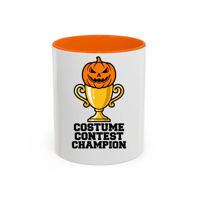 A pumpkin-topped trophy for the costume contest champion, on an orange accent mug