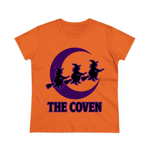 Three witches flying across the moon over THE COVEN, on an orange women's t-shirt