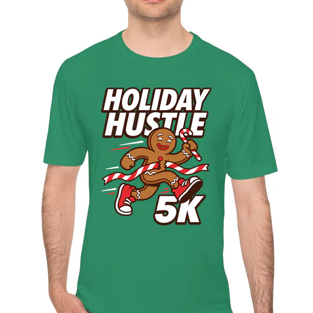 A gingerbread cookie sprinting to the Holiday Hustle 5K finish, on a kelly green performance tee