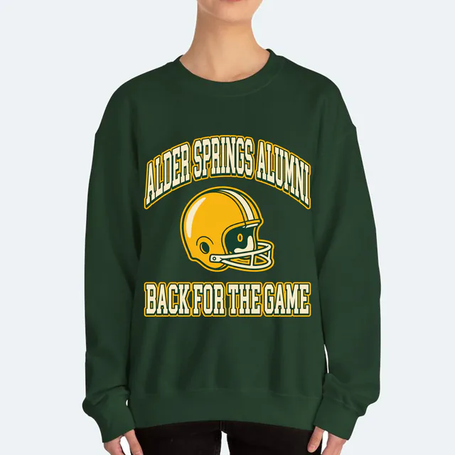 A vintage helmet under a collegiate arch, ALDER SPRINGS ALUMNI, on a forest green adult crewneck