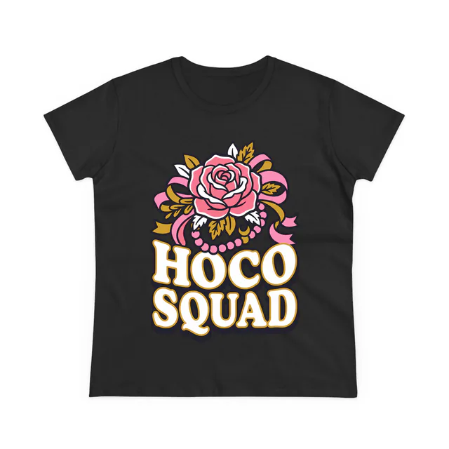 A rose wrist corsage with looping ribbons, HOCO SQUAD, on a black women's t-shirt