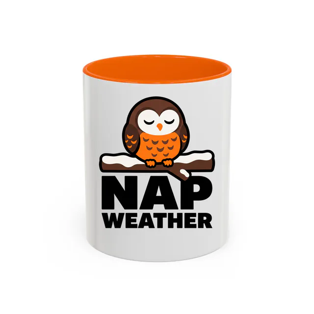 A puffed-up owl on a snowy branch, NAP WEATHER, on an orange accent mug