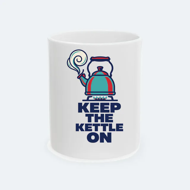 A whistling kettle with curling steam, KEEP THE KETTLE ON, on a white ceramic mug