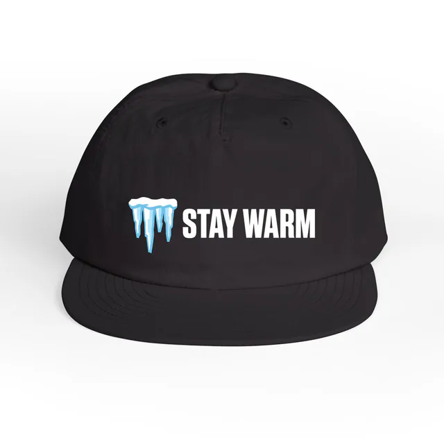A cluster of icicles beside STAY WARM, on a midnight blue surf cap