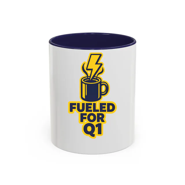 A coffee with a lightning bolt in the steam, FUELED FOR Q1, on a navy accent mug