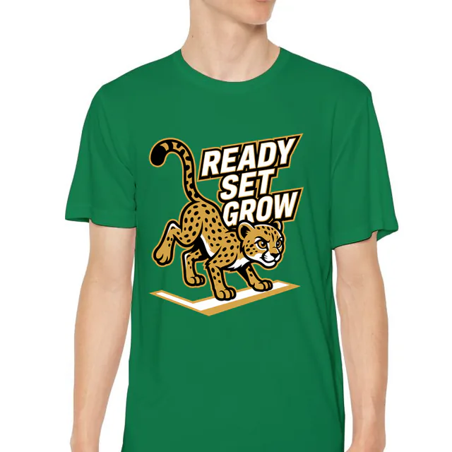 A cheetah cub at the starting line, READY SET GROW, on a kelly green youth performance tee