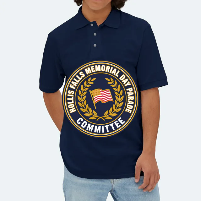 A flag and laurel emblem for the Hollis Falls parade committee, on a navy adult polo