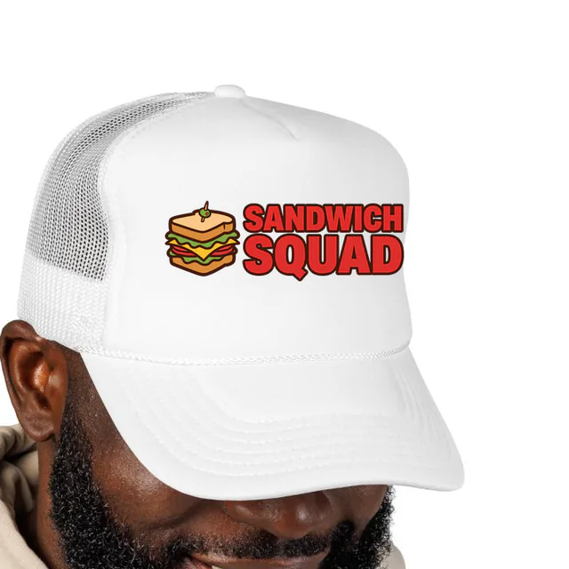 A stacked sandwich beside SANDWICH SQUAD, on a white foam trucker hat