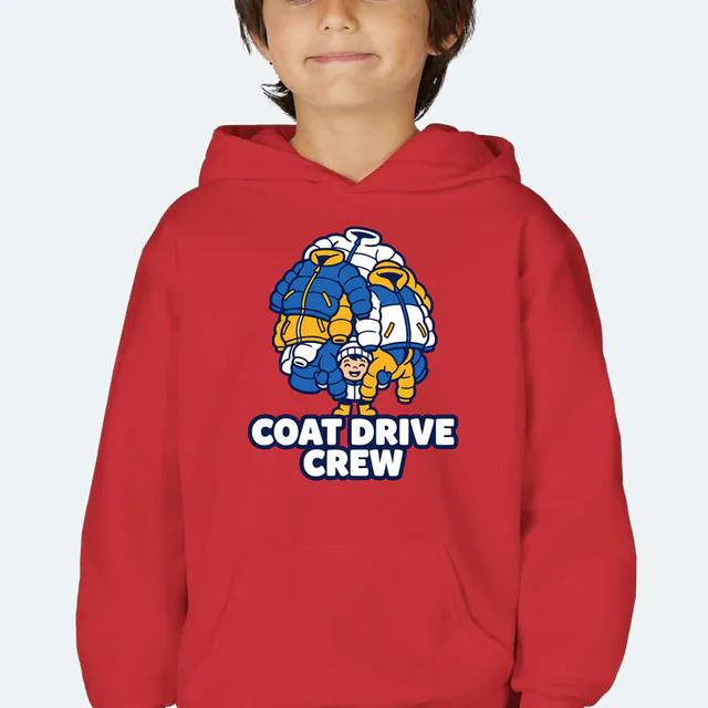 A kid carrying a tall pile of coats, COAT DRIVE CREW, on a red youth hoodie