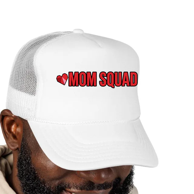 A paper heart beside MOM SQUAD, on a white foam trucker hat