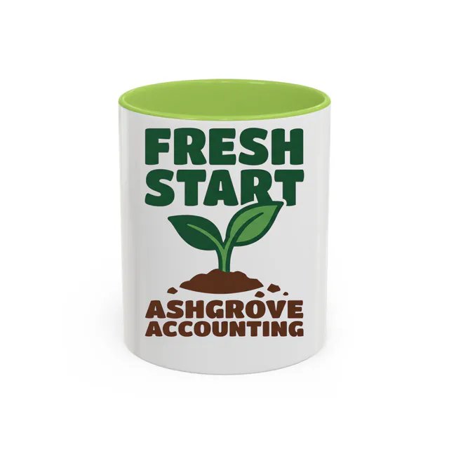 A seedling with its first two leaves, FRESH START, on a light green accent mug