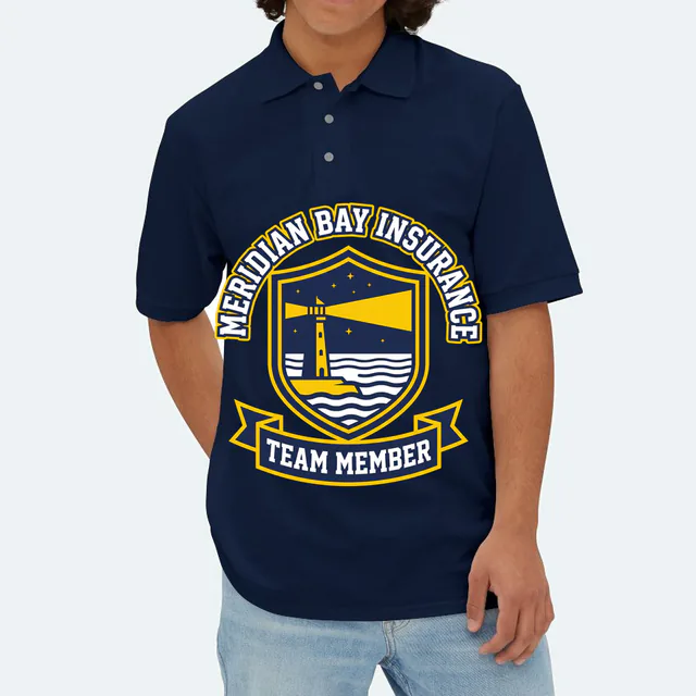 A lighthouse crest for the Meridian Bay Insurance team, on a navy adult polo