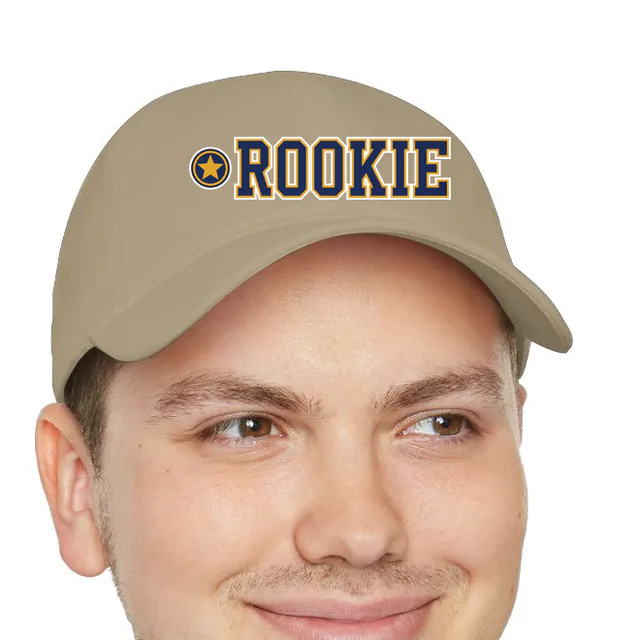 A gold star beside ROOKIE, on a khaki dad hat