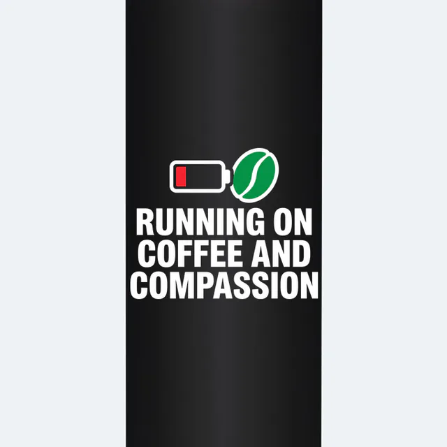 A low battery with a coffee bean, RUNNING ON COFFEE AND COMPASSION, on a black steel tumbler