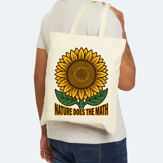 A sunflower with a spiral seed head, NATURE DOES THE MATH, on a natural canvas tote