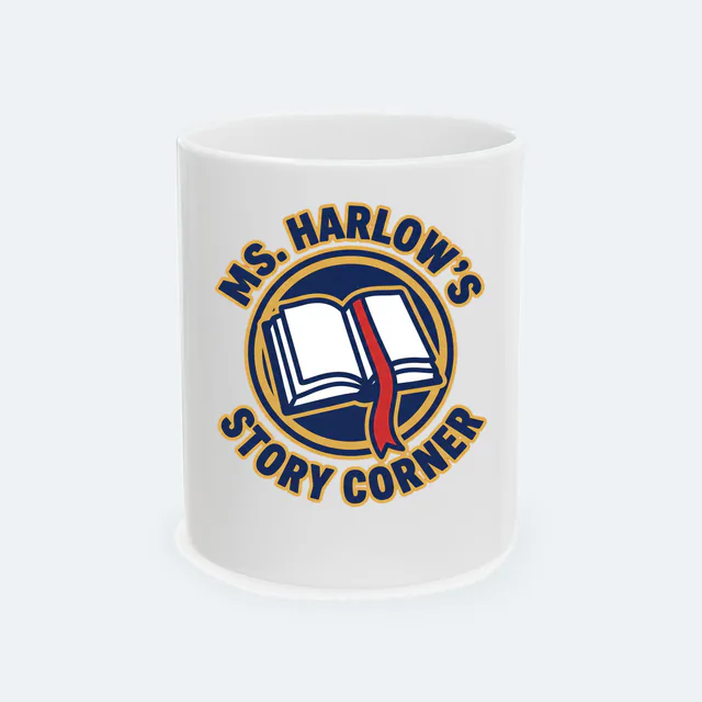 An open book with a ribbon bookmark, MS. HARLOW'S STORY CORNER, on a white ceramic mug