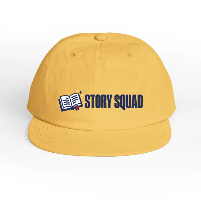 An open book beside STORY SQUAD, on a sunset surf cap